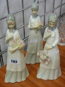 Three Valencia figurines of girls with flowers
