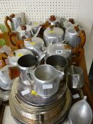 Large parcel of Picquot ware and a box of kitchen cookery items (under the table)