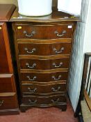 Serpentine fronted reproduction narrow chest of six drawers