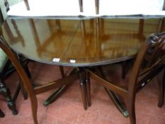 Circular single pedestal reproduction dining table with six dining chairs (four plus two), (vendor