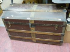Fine wooden and metal banded domed trunk