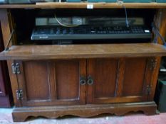 Rustic entertainment cabinet with fine Sharp turntable/music centre system and accompanying speaker