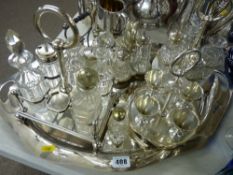 Five electroplated condiments on an oval tray