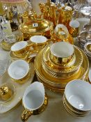 Large parcel of Royal Worcester gilt dinner and breakfast ware