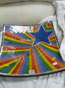 Attractive multi-coloured contemporary fruit bowl