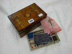 Small jewellery box with interior compartments and contents including bead items