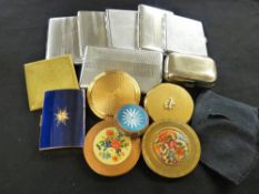 Parcel of six chrome cigarette cases and a parcel of powder compacts