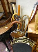 Brass effect fireguard and parcel of walking sticks, umbrellas, shooting sticks in a brass