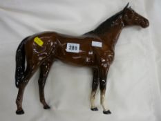 Beswick pottery brown standing stallion, white front ankles, tail attached to right hind leg, 30 cms