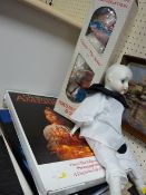 Boxed Heritage Mint Ltd 'Chester the Jester', a porcelain headed doll and two editions of American