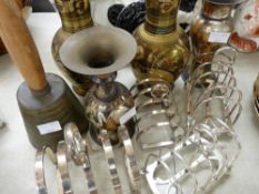 Four EPNS toast racks and two pairs of Egyptian vases and a hand bell