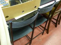 Contemporary glass topped dining table on a heavy stone pedestal with a set of six chairs
