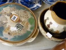 Three modern pottery pieces including jug (cat decorated), fruit bowl (pig decorated) and a lidded