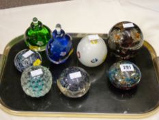 Six various paperweights and two bottle paperweights