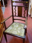 Classical shaped elbow chair with inlaid pattern