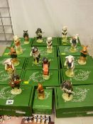Fine collector's lot of fifteen boxed Beswick pottery pigs, majority playing musical instruments