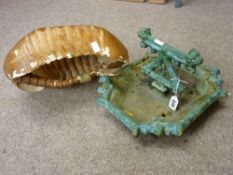 Cast iron foot scraper and an armadillo basket