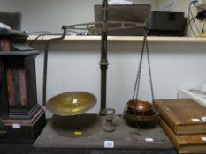 Set of old countertop scales with trays and weights