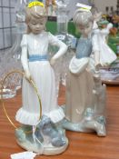 Nao figurine of girl with hoop and dog and Nao figurine of girl and butterfly