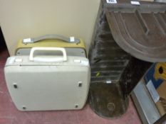 Two vintage typewriters and a bakelite bookshelf