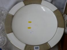 Large circular pottery and metal mounted dished charger and a Tiffany style red and white hanging