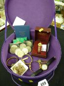 Purple jewellery box with quantity of crowns, lady's watches and minor jewellery