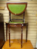 A reproduction mahogany leather topped side table with single drawer & a matching twin-flap side
