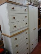An excellent modern four-piece bedroom suite of two-door wardrobe with lower drawers & three various