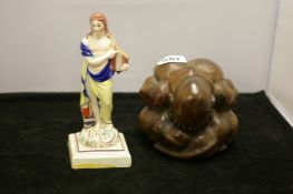 An abstract carving & a classical figure labelled 'Apollo'