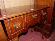 A reproduction yew wood low boy