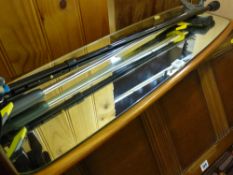 A mid-century teak wall mirror, two helping hand pick up sticks & an adjustable walking stick