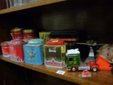 Quantity of advertising tins, Diecast vehicles etc