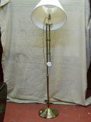 A brass effect standard lamp E/T