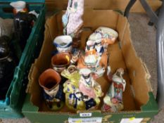 A quantity of Staffordshire groups, Toby Jugs, Oriental figurines etc