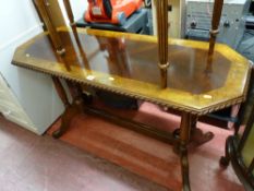 A reproduction walnut & cross banded mahogany side table
