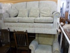 A good quality modern upholstered three-seater settee & matching armchair with footstool