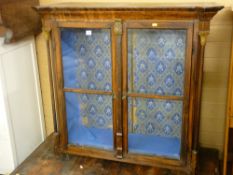 A two-door glass fronted scumble decorated display cabinet
