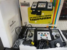 A Videomaster Visionscore circa 1980s colour TV game with box & sleeve
