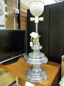 A continental chrome three-light lamp