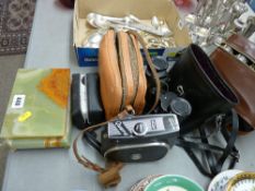 Quantity of vintage binoculars in cases, an onyx cigarette box & a cased quartz cine camera etc