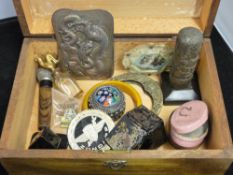 A wooden box containing mixed collectables