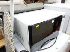 A Samsung microwave oven & ironing board E/T