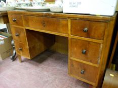 A European pedestal desk, pine carcass with walnut veneer