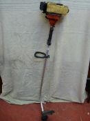 A petrol grass trimmer