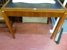 A vintage two-drawer writing table