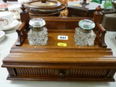 Two treen biscuit barrels & a treen desk stand