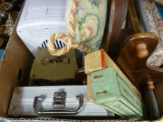 A box of mixed items including magazine rack, linen etc