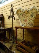 A two-tier side table, a set of three glass topped reproduction tables, a mid-century standard