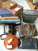 A small parcel of collectables including old books, camera, Whitefriars-style vase, paperweight etc