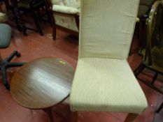 An upholstered side chair & a circular top side table